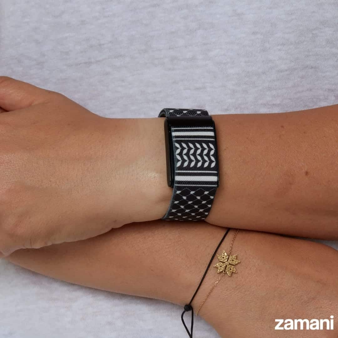 Black Keffiyeh WHOOP band worn on the wrist